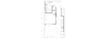 A floor plan of a house with a kitchen, living room, and bathrooms.