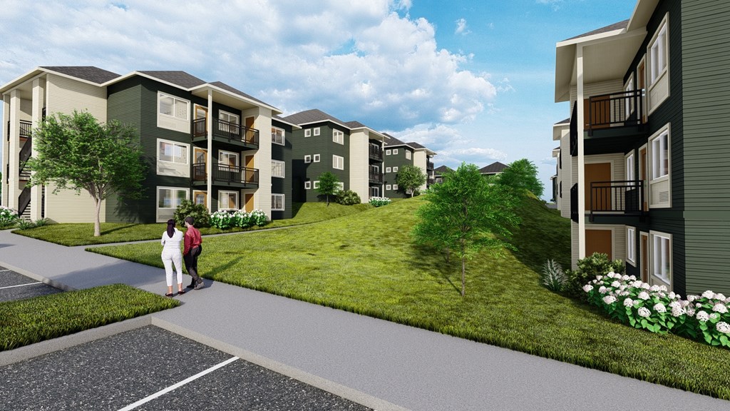 a rendering of an apartment building on a grassy hill