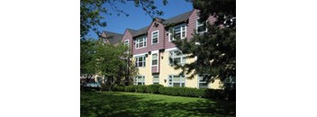 a house with a yard in front of it