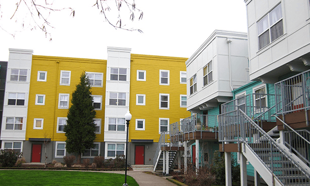 a group of buildings with different colors on them