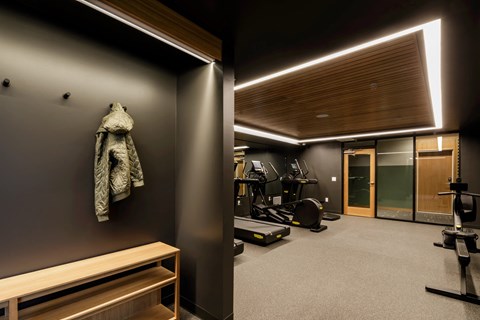 a coat hanging on a wall in a gym room at Slabtown Square Apartments, Portland , Oregon