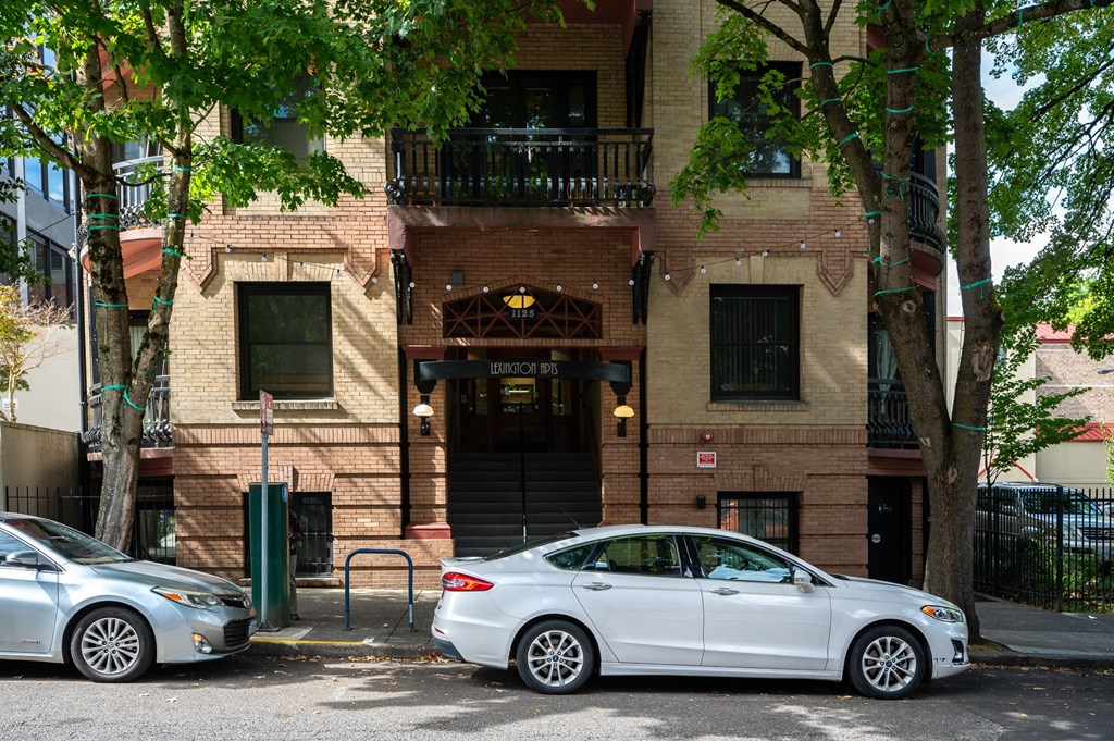 a house with a white car parked in front of it