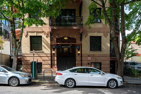 a house with a white car parked in front of it