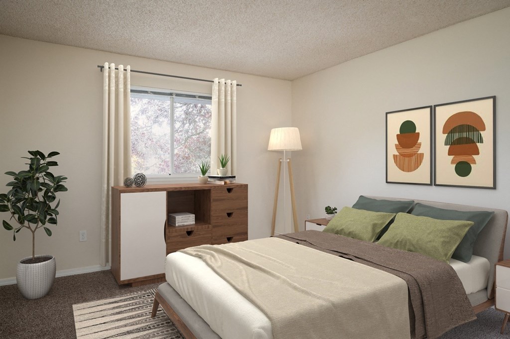 a bedroom with a bed and a dresser and a window