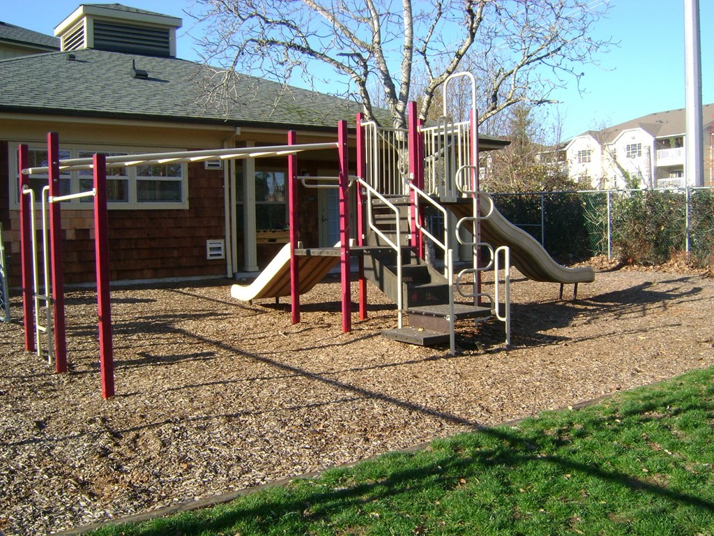 a playground in front of a house