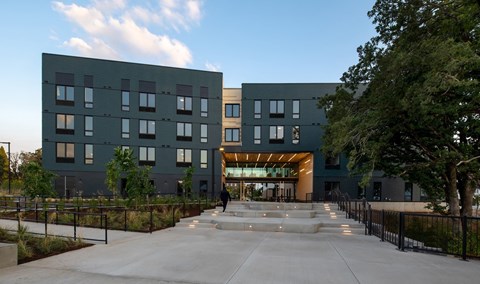 a large building with stairs in front of it