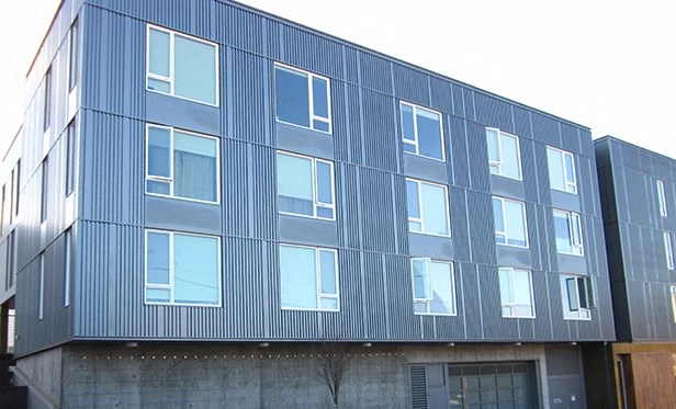 the side of a building with a lot of windows