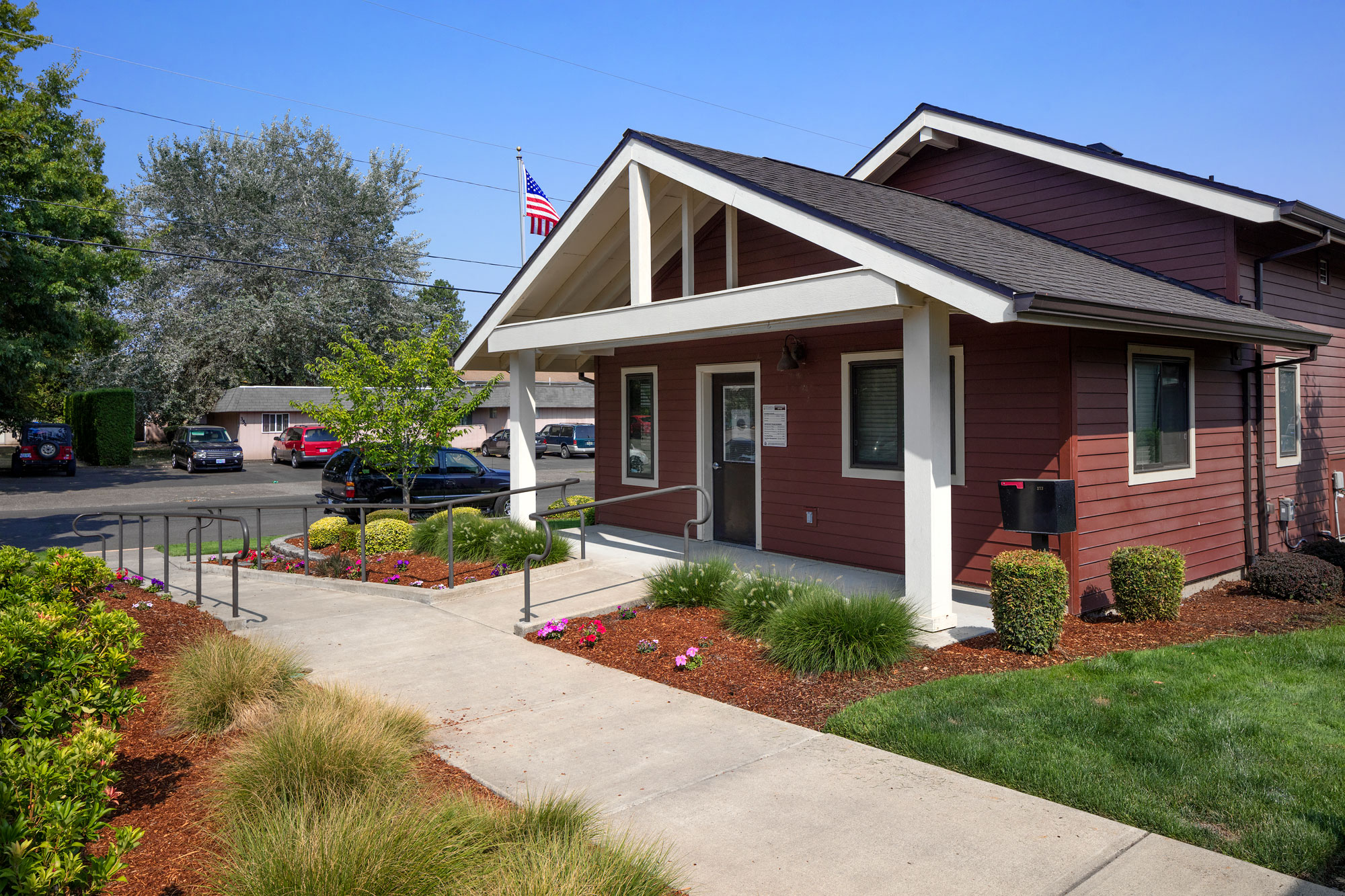 House with yard, walkway and road