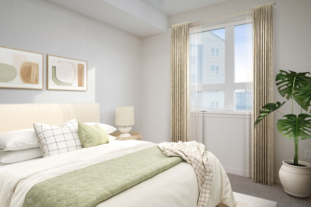 a bedroom with a bed and a window