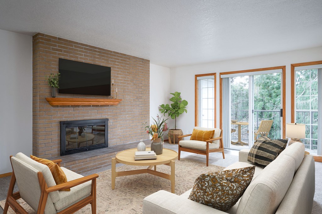 a living room with a fireplace and a sliding glass door
