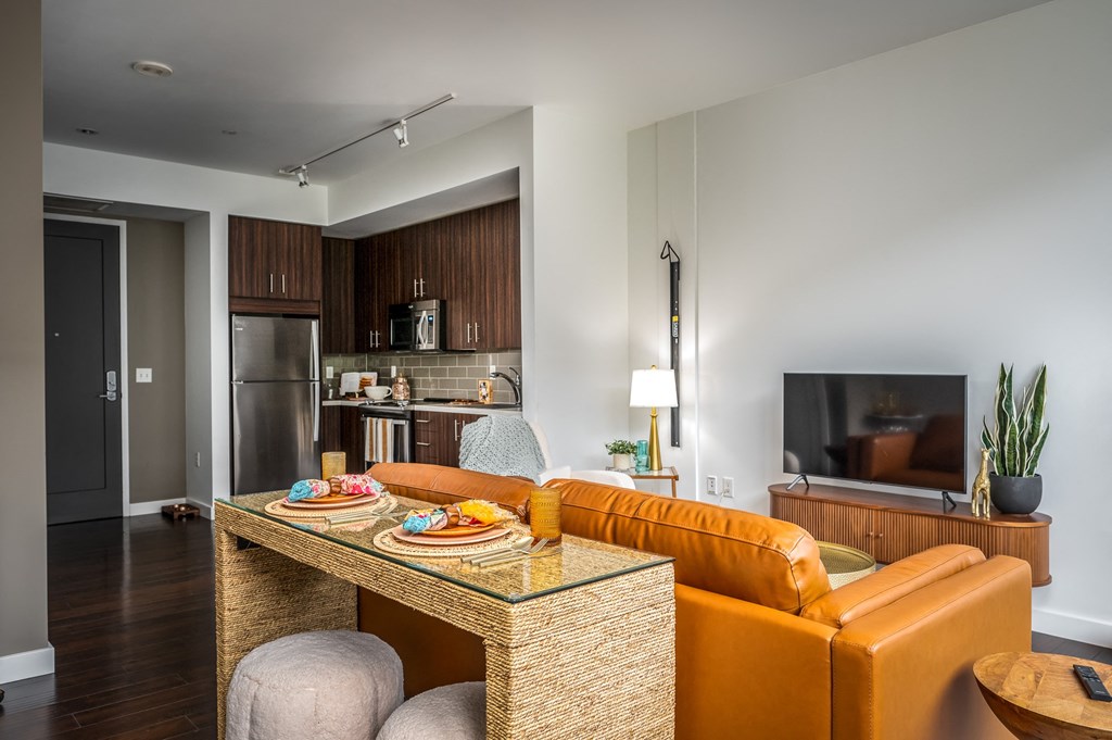 a living room with a couch and a table