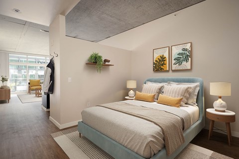 a bedroom with a bed and a closet
