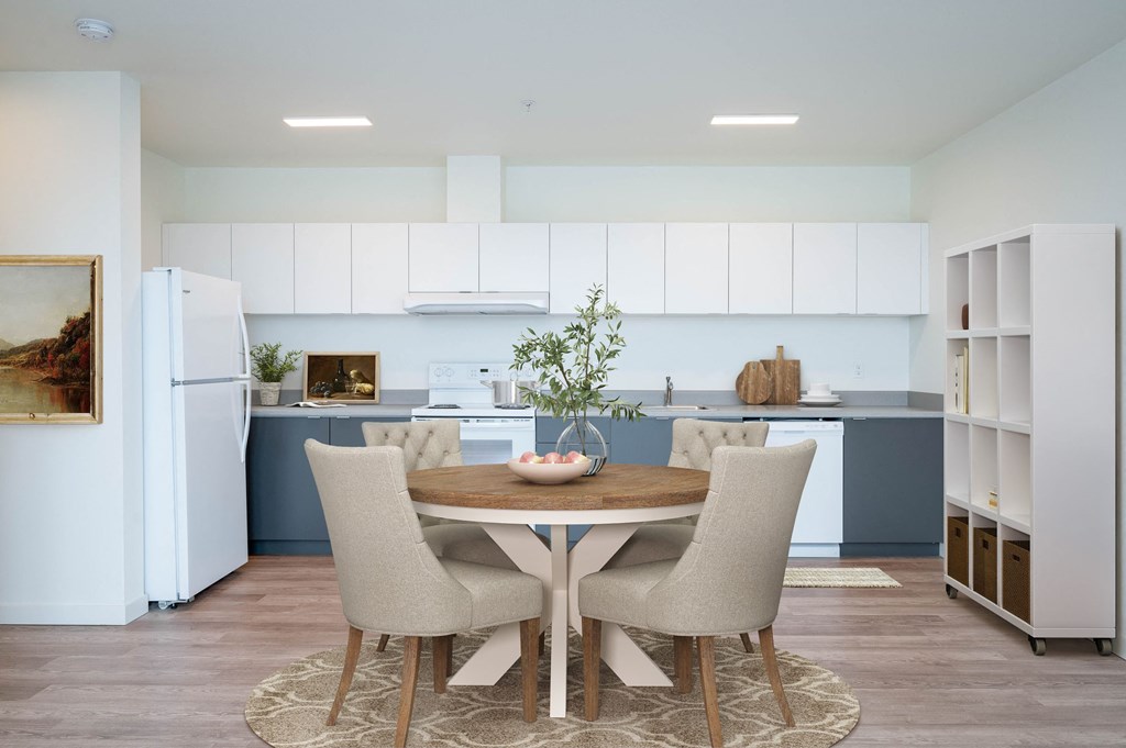 a kitchen and dining area in a 555 waverly unit