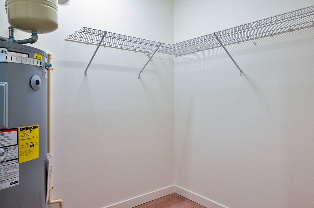 a walk in closet in a 555 waverly unit