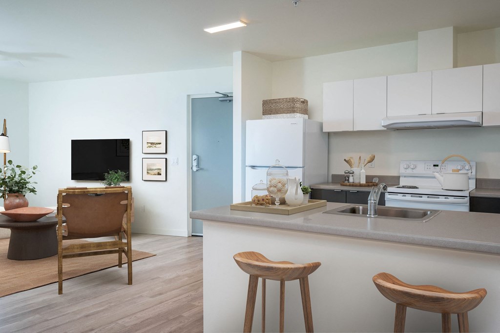 a kitchen and living room in a 555 waverly unit