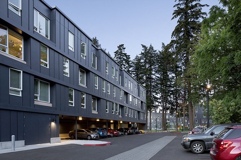 a building with a parking lot in front of it