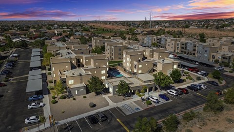 A parking lot is in front of a building.