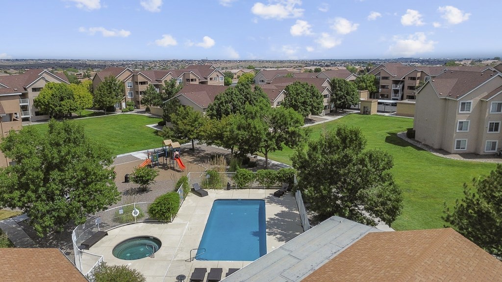 A view of a swimming pool from a balcony.
