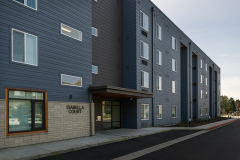 Isabella Court is a modern apartment complex with a sleek design.