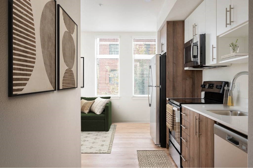 a kitchen and living room in a small apartment