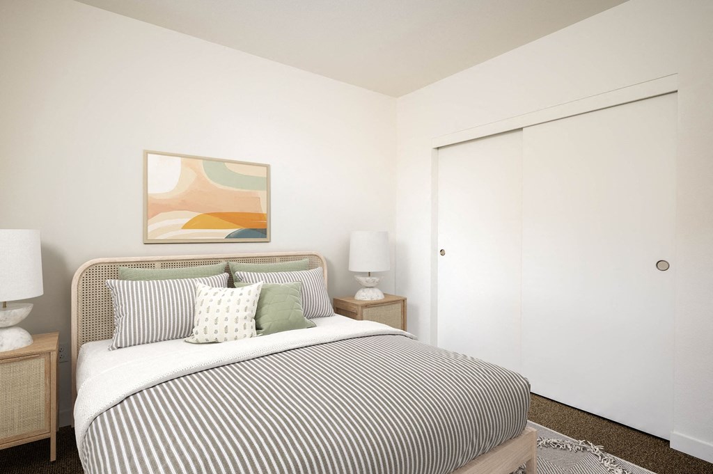 a bedroom with a bed and a closet