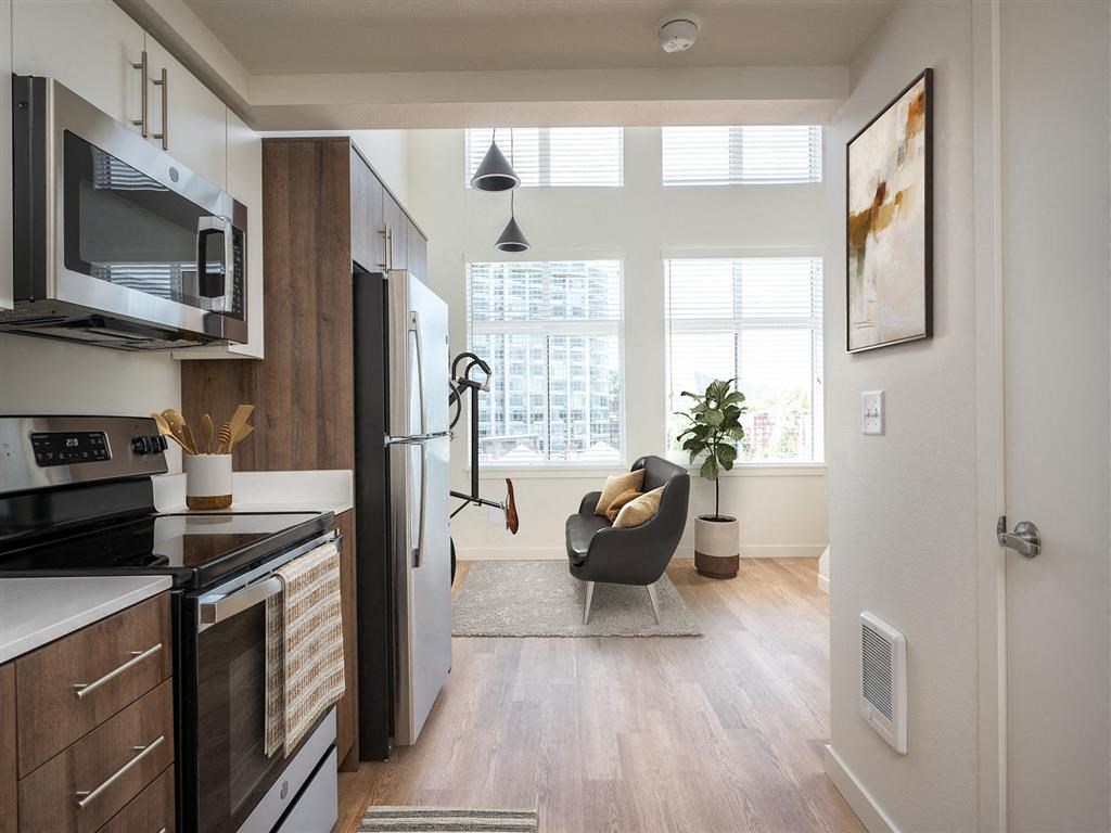 an overhead view of a living room with a bed and a futon