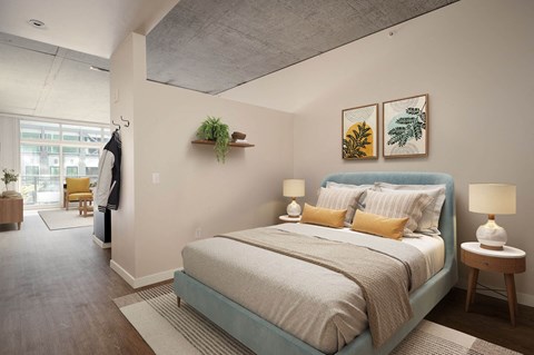 a bedroom with a bed and a closet