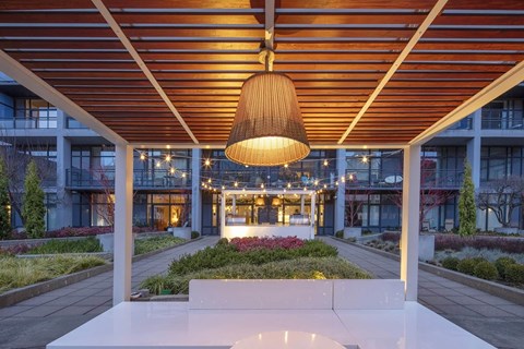 a view of the lobby of a building with a pendant light