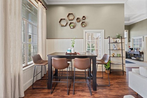 a dining or meeting table in a corner of the clubhouse at Centerville Manor Apartments