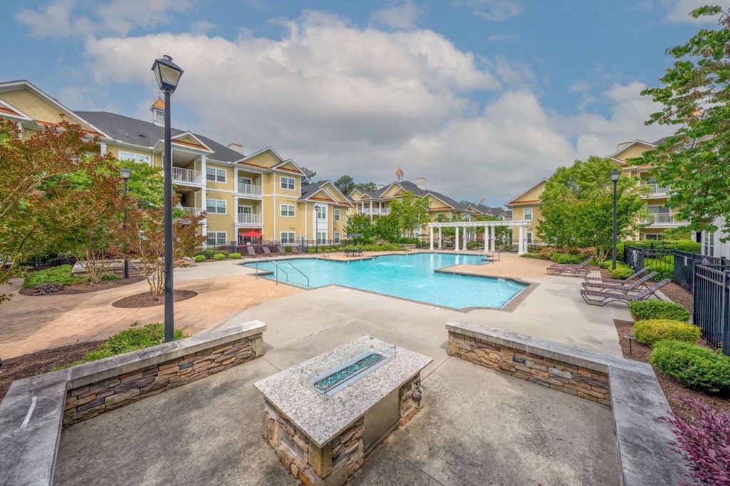 swimming pool and outdoor fireplace at Fenwyck Manor Apartments in Chesapeake, VA