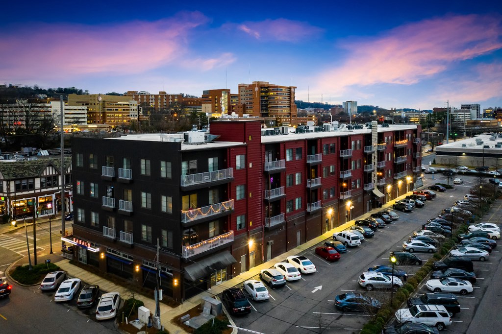 Rise Lakeview Apartments and parking lot at Twilight in Downtown Birmingham