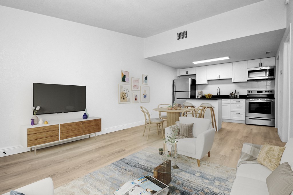 a living room with a couch and a table and a television
