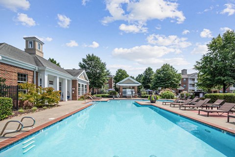 a large crystal blue swimming pool and spacious sundeck at Centerville Manor Apartments in Virginia Beach
