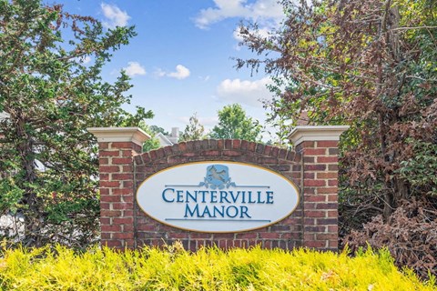 the logo monument sign at the entrance to Centerville Manor