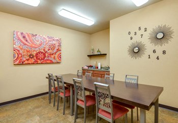 fitness center with cardio and strength training equipment at The Point at Fairview Apartments, Prattville, 36066
