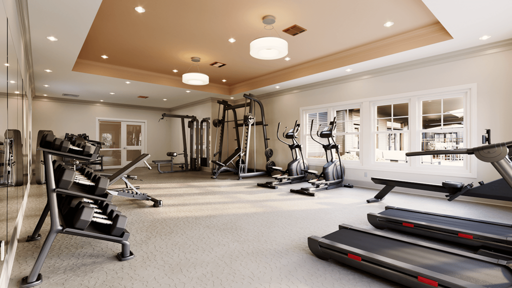 a spacious fitness center with cardio and strength training equipment at Archer Green Apartments