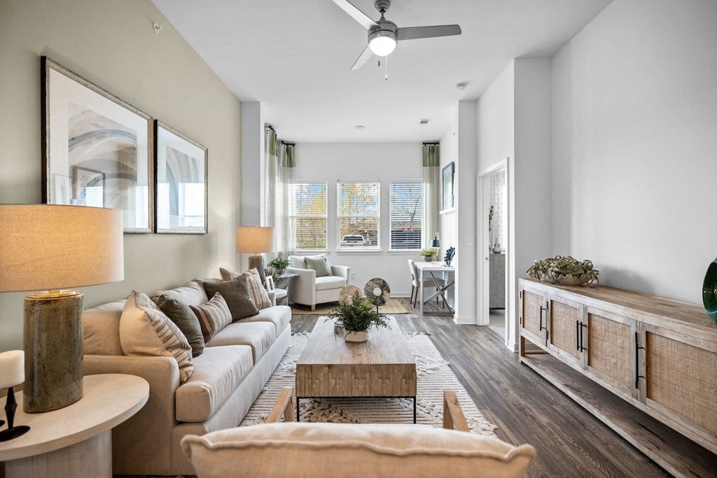 a living room with a couch and a table