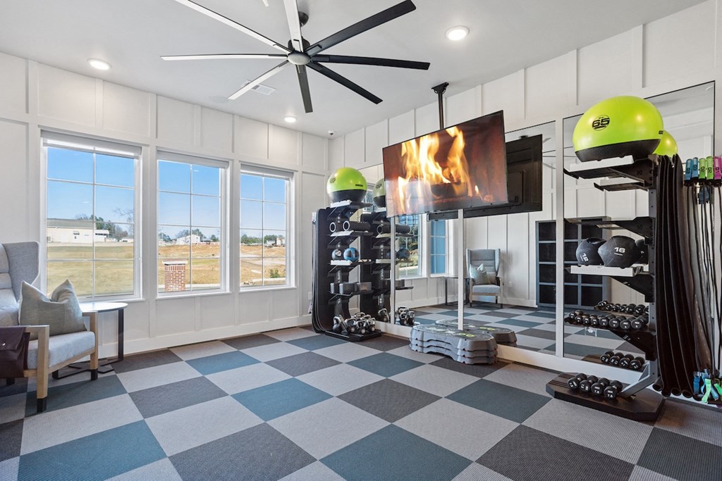 Sanctuary at Indian Creek's large yoga studio with equipment and tons of natural light