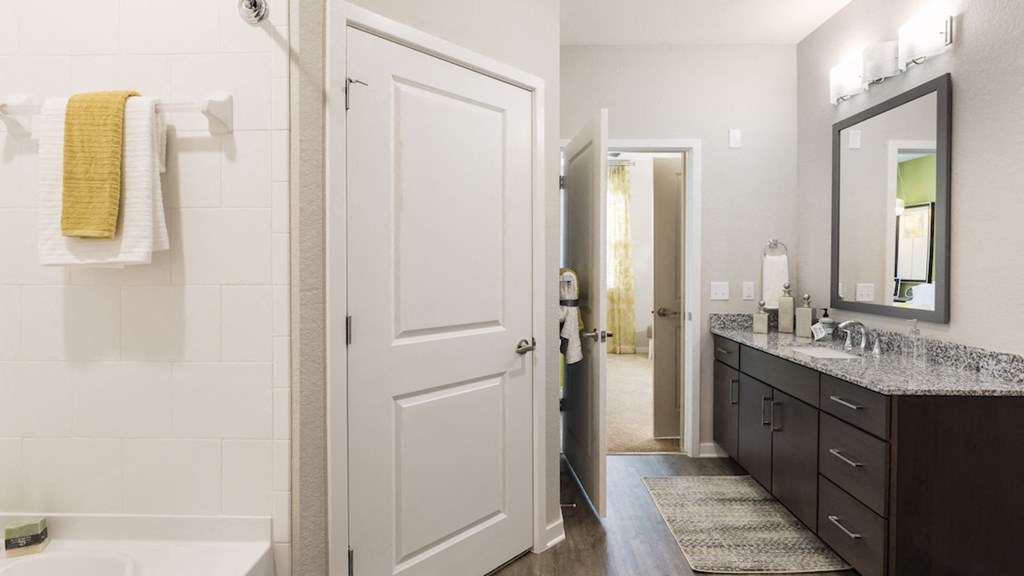 large bathroom with spacious granite  vanity