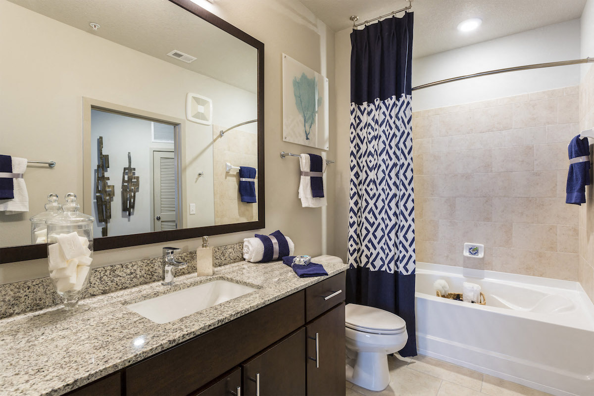 Luxurious bathroom with granite countertops  at LandonHouse Apartments in Lake Nona, Orlando, FL 32827