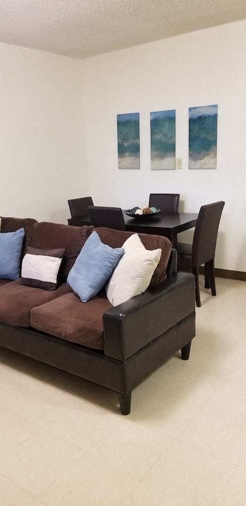 comfortable couch and chairs and tables