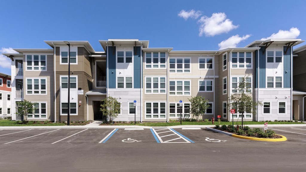 ample parking in front of stylish apartment exteriors