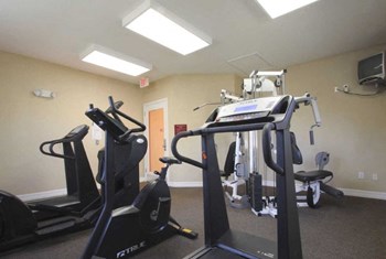 Fitness center with cardio and strength training equipment - Photo Gallery 6