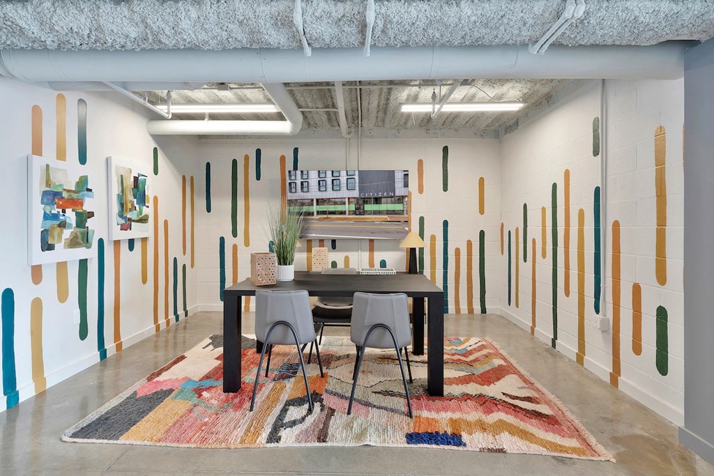 large work area with desk and TV at Citizen Birmingham