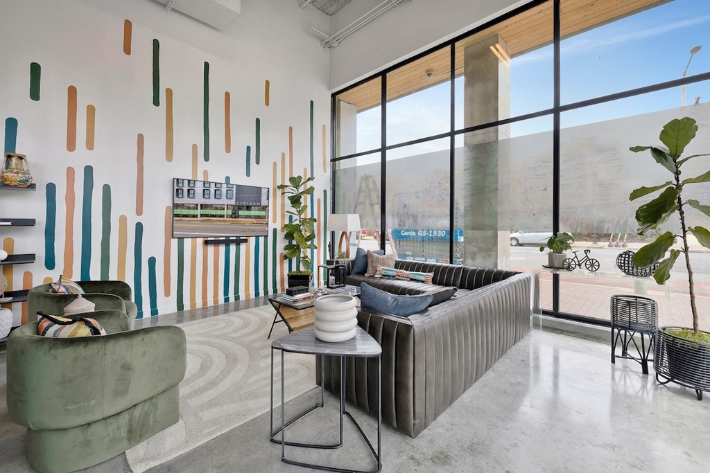 ground floor lounge with massive windows at Citizen Birmingham