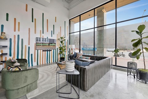 ground floor lounge with massive windows at Citizen Birmingham