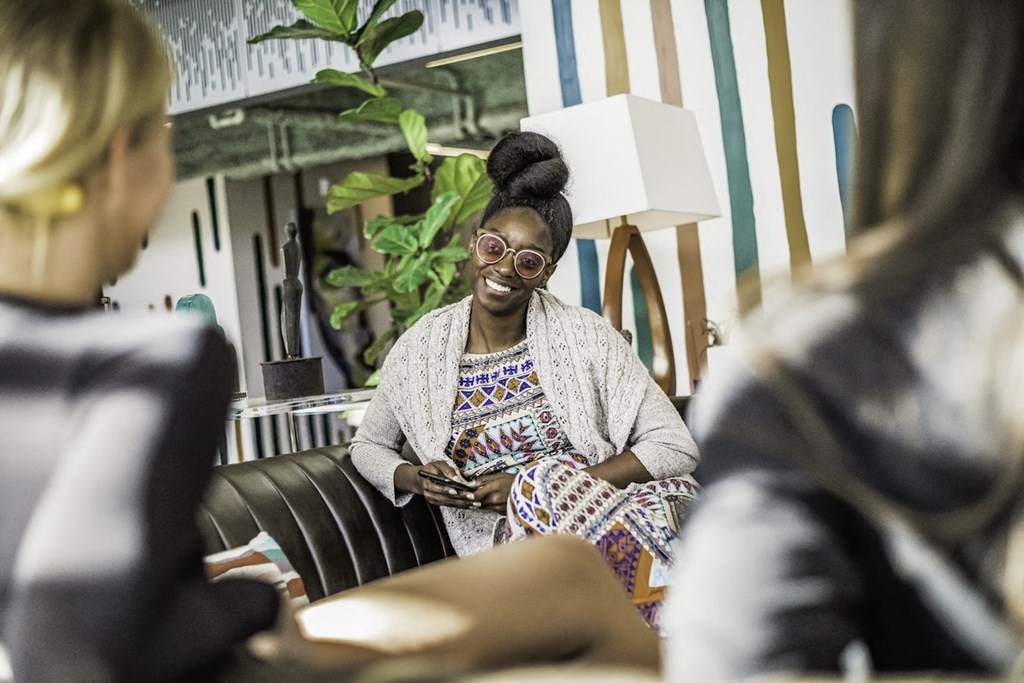 a group of residents relaxing and laughing at Citizen Birmingham