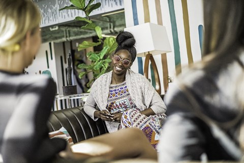 a group of residents relaxing and laughing at Citizen Birmingham