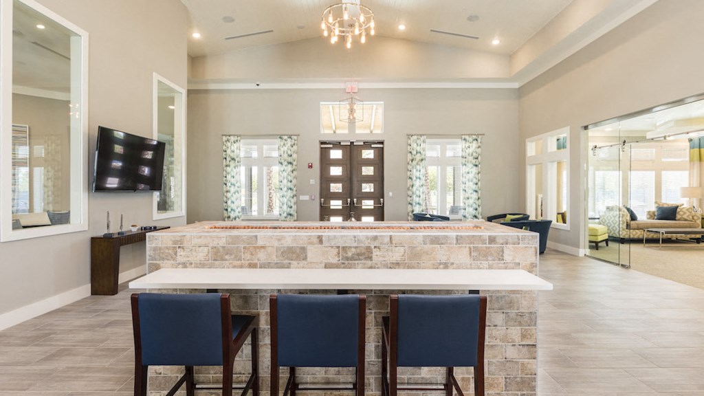 clubhouse leasing area with table and chairs