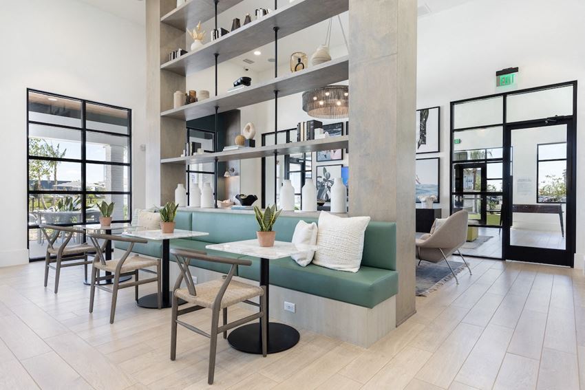 Concorde-cafe-seating tables, chairs, and bench seating in clubhouse at Lake Nona Concorde